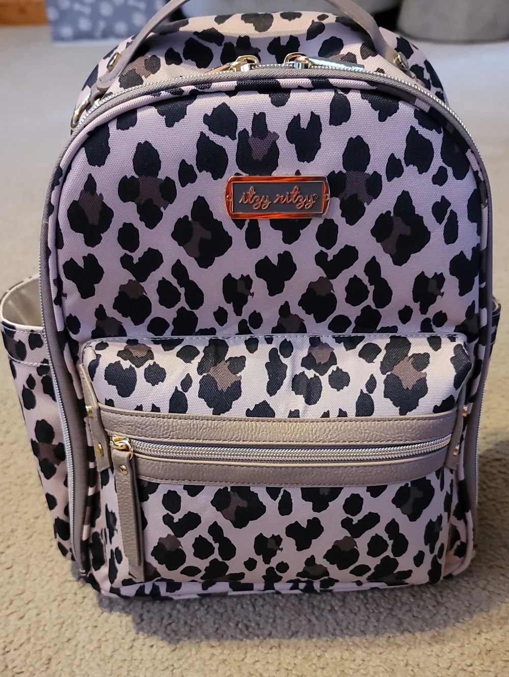 Itzy Ritzy Tan and Black Leopard Print Mini Backpack